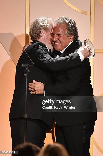 Director/producer Ridley Scott presents the Milestone Award to honoree Jim Gianopulos onstage at the 27th Annual Producers Guild Of America Awards at...