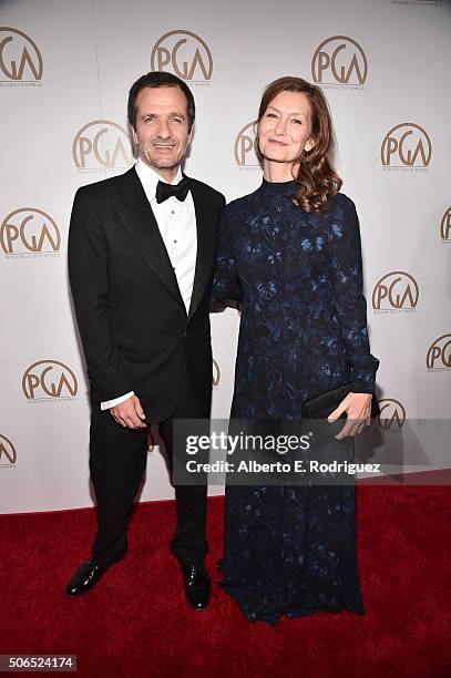 Honoree David Heyman and designer Rose Uniacke attend the 27th Annual Producers Guild Of America Awards at the Hyatt Regency Century Plaza on January...