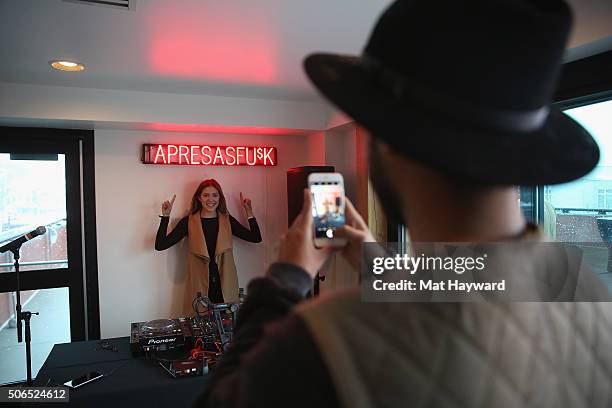 Guests take photos at NYLON + Dream Hotels Apres Ski at Sundance Film Festival on January 23, 2016 in Park City, Utah.