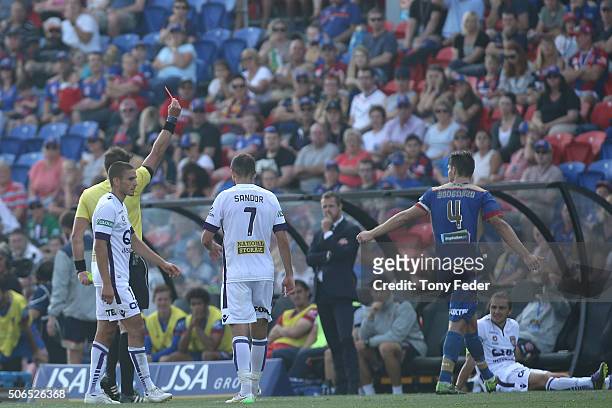 Nigel Boogaard of the Jets walks off after receiving a red card during the round 16 A-League match between the Newcastle Jets and the Perth Glory at...