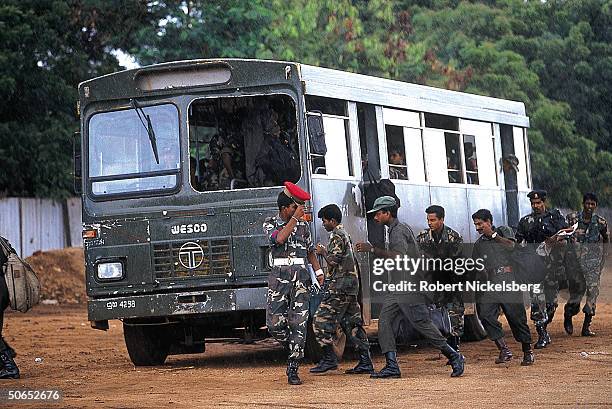 Sri Lankan government army soldiers boarding a bus to go on home leave after serving in Jaffa in the war against the Tamil Tigers.