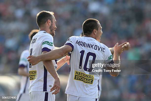 Nebojsa Marinkovic of the Glory celebrates a goal with team mate Gyorgy Sandor during the round 16 A-League match between the Newcastle Jets and the...