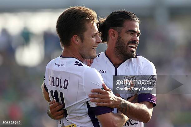 Chris Harold of the Glory celebrates with Aryn Williams after scoring a goal during the round 16 A-League match between the Newcastle Jets and the...