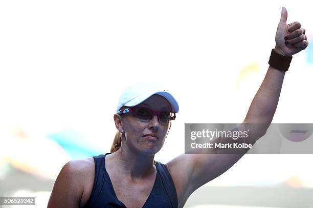 Anastasia Rodionova of Australia celebrates winning her third round doubles match with Arina Rodionova of Australia against Dominika Cibulkova and...