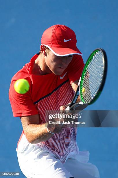 Oliver Anderson of Australia plays a backhand in his first round match against Lukas Klein of Slovakia during the Australian Open 2016 Junior...