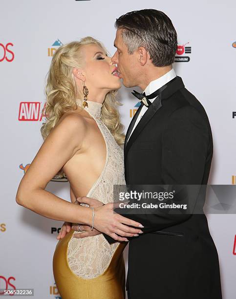 Co-host of the 2016 Adult Video News Awards, adult film actress Anikka Albrite kisses her husband, adult film actor/director Mick Blue as they attend...