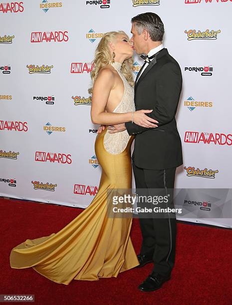 Co-host of the 2016 Adult Video News Awards, adult film actress Anikka Albrite kisses her husband, adult film actor/director Mick Blue as they attend...