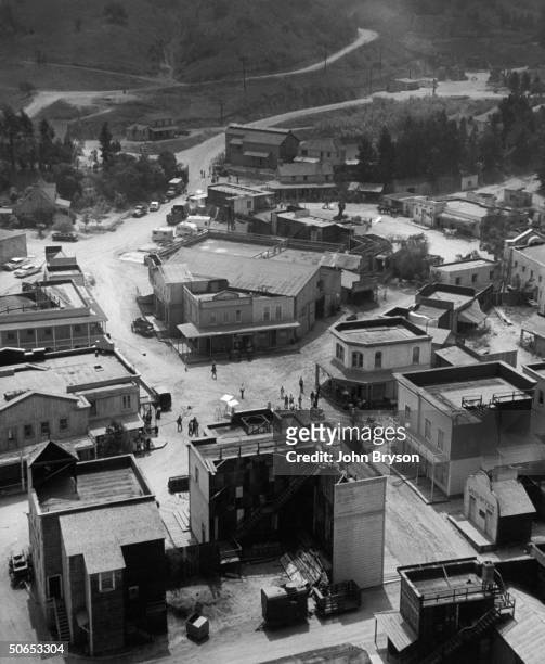 Aerial view of 2 TV Westerns being filmed at once on the Warner Bros. Lot.