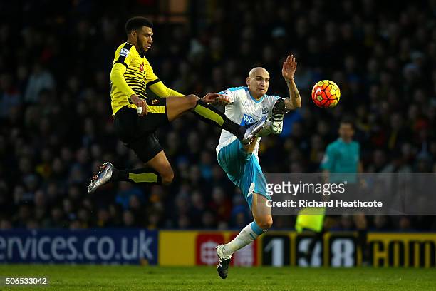 Etienne Capoue of Watford and Jonjo Shelvey of Newcastle United compete for the ball during the Barclays Premier League match between Watford and...