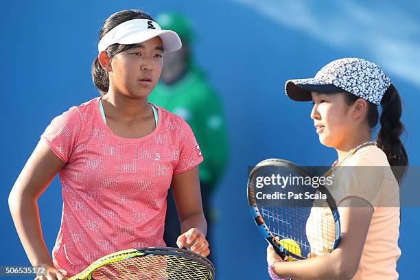 Naho Sato and Stako Sueno of Japan compete in their match against Alexandra Bozovic and Kaylah McPhee of Australia during the Australian Open 2016...