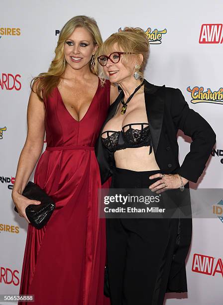 Adult film actress Julia Ann and adult film actress/director Nina Hartley attend the 2016 Adult Video News Awards at the Hard Rock Hotel & Casino on...