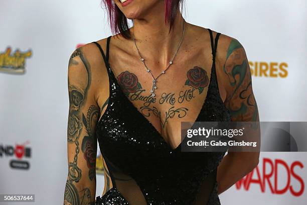 Adult film actress Anna Bell Peaks, tattoos, necklace detail, attends the 2016 Adult Video News Awards at the Hard Rock Hotel & Casino on January 23,...