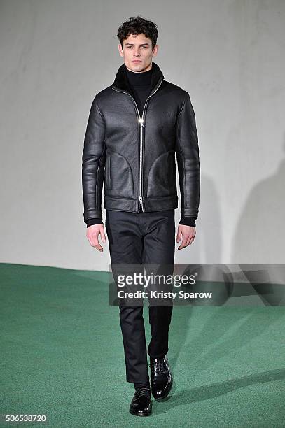 Model walks the runway during the Officine Generale Menswear Fall/Winter 2016-2017 show as part of Paris Fashion Week on January 24, 2016 in Paris,...