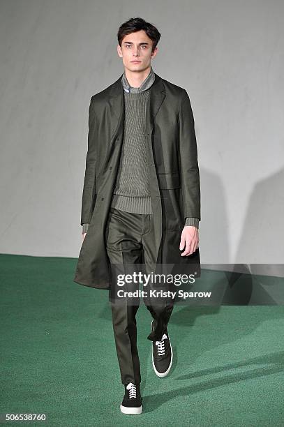 Model walks the runway during the Officine Generale Menswear Fall/Winter 2016-2017 show as part of Paris Fashion Week on January 24, 2016 in Paris,...