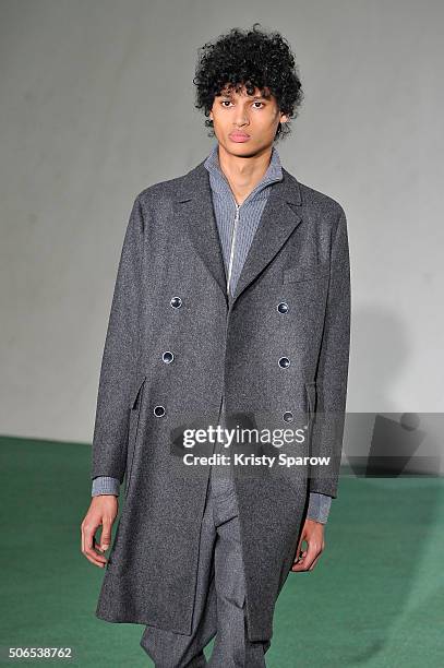 Model walks the runway during the Officine Generale Menswear Fall/Winter 2016-2017 show as part of Paris Fashion Week on January 24, 2016 in Paris,...