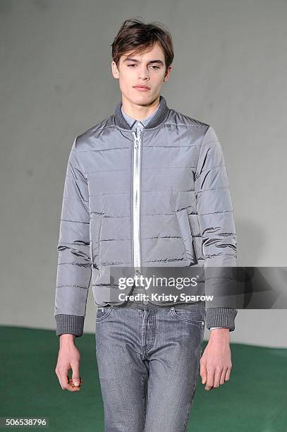 Model walks the runway during the Officine Generale Menswear Fall/Winter 2016-2017 show as part of Paris Fashion Week on January 24, 2016 in Paris,...