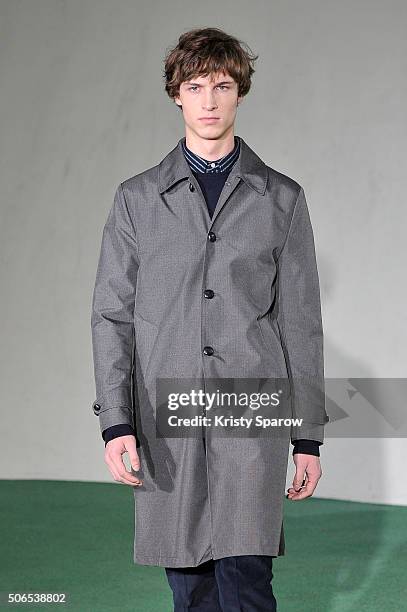 Model walks the runway during the Officine Generale Menswear Fall/Winter 2016-2017 show as part of Paris Fashion Week on January 24, 2016 in Paris,...