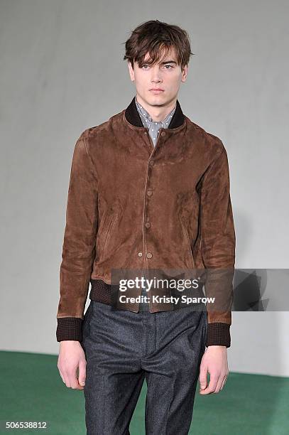 Model walks the runway during the Officine Generale Menswear Fall/Winter 2016-2017 show as part of Paris Fashion Week on January 24, 2016 in Paris,...