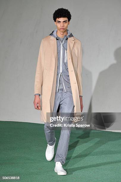 Model walks the runway during the Officine Generale Menswear Fall/Winter 2016-2017 show as part of Paris Fashion Week on January 24, 2016 in Paris,...