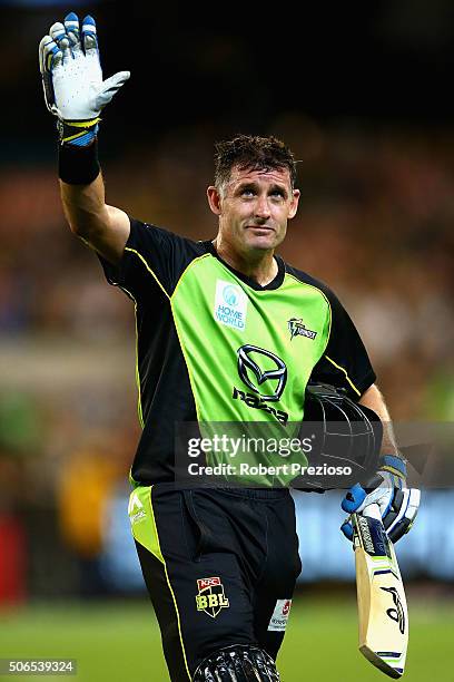 Michael Hussey of the Thunder walks off after being dismissed by Adam Zampa of the Stars during the Big Bash League final match between Melbourne...