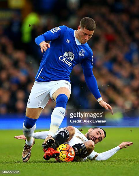 Ross Barkley of Everton battles for the ball with Leon Britton of Swansea City during the Barclays Premier League match between Everton and Swansea...