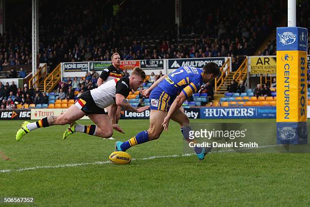 Carl Ablett of Leeds Rhinos touches down what would've been the opening try, only to be overturned by the referee during the friendly match between...