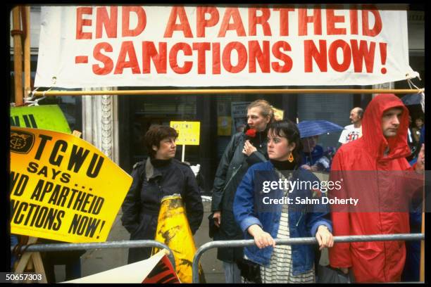 Anti-Apartheid demonstrators holding vigil for commonwealth decision in favor of economic sanctions toward South Africa