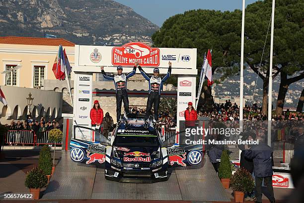 Sebastien Ogier of France and Julien Ingrassia of France celebrate their victory during Day Four of the WRC Monte Carlo on January 24, 2016 in Gap,...