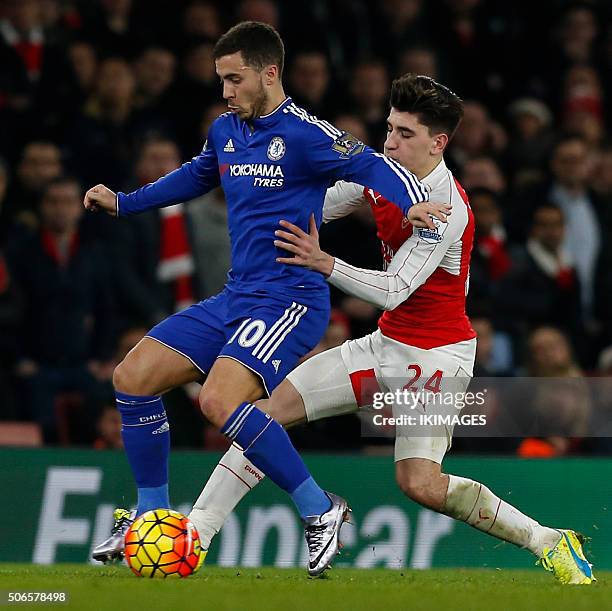 Arsenal's Spanish defender Hector Bellerin vies with Chelsea's Belgian midfielder Eden Hazard during the English Premier League football match...