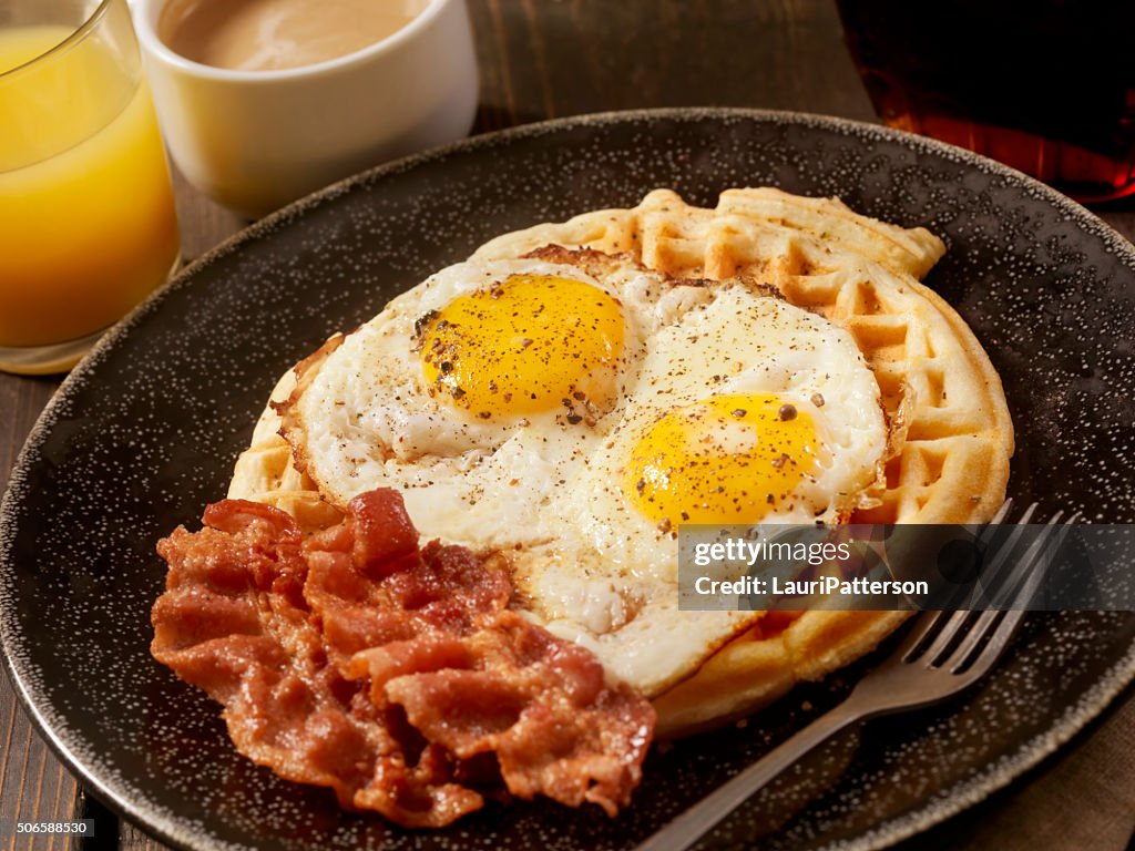 Waffles With Fried Eggs And Bacon High-Res Stock Photo - Getty Images