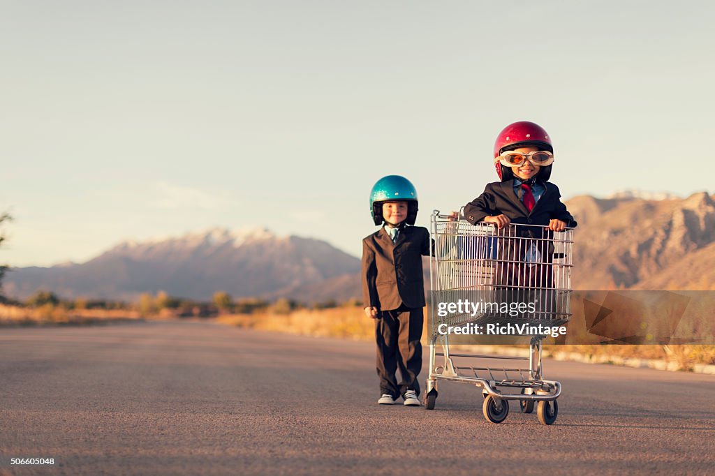 Young Business Boys Race in Shopping Cart