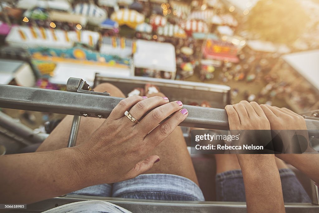 Mother and daughter on Ferris wheel