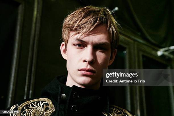 Model poses Backstage prior the Dries Van Noten Menswear Fall/Winter 2016-2017 show as part of Paris Fashion Week on January 21, 2016 in Paris,...