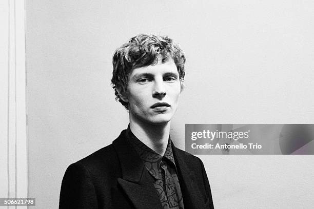 Image has been converted to black and white.) A model poses Backstage prior the Dries Van Noten Menswear Fall/Winter 2016-2017 show as part of Paris...