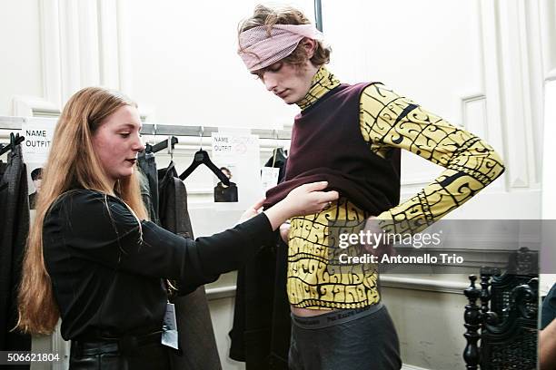 Model poses Backstage prior the Dries Van Noten Menswear Fall/Winter 2016-2017 show as part of Paris Fashion Week on January 21, 2016 in Paris,...