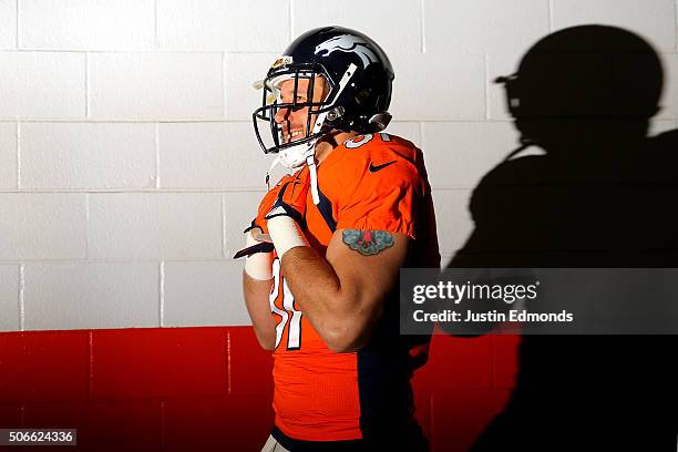 Owen Daniels of the Denver Broncos walks through the tunnel before the AFC Championship game against the New England Patriots at Sports Authority...