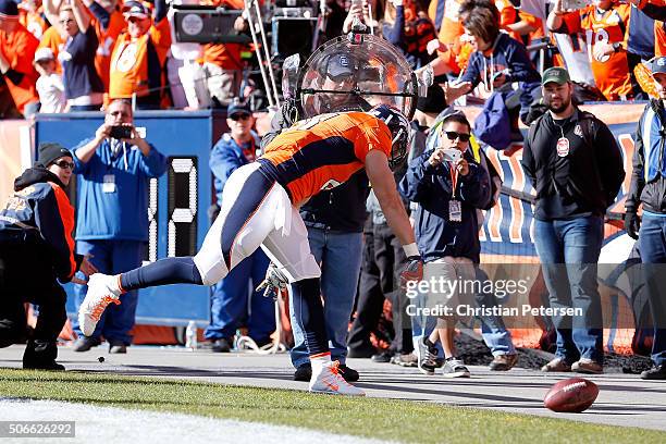 Owen Daniels of the Denver Broncos celebrates after scoring a 21-yard first quarter touchdown against the New England Patriots in the AFC...