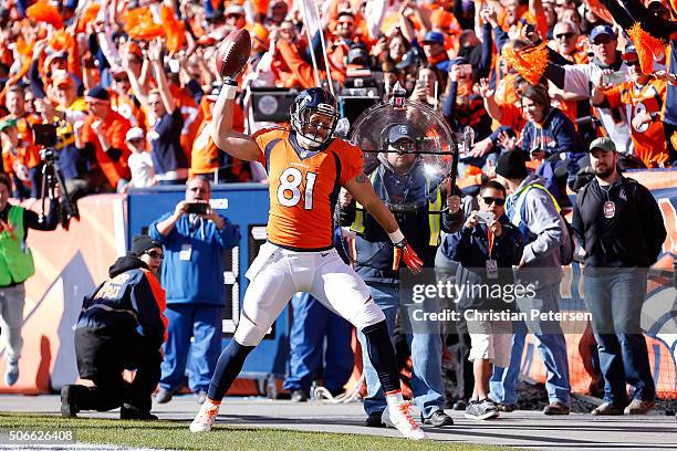 Owen Daniels of the Denver Broncos celebrates after scoring a 21-yard first quarter touchdown against the New England Patriots in the AFC...