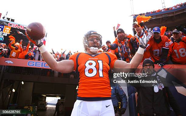Owen Daniels of the Denver Broncos celebrates after scoring a 12-yard touchdown in the second quarter against the New England Patriots in the AFC...