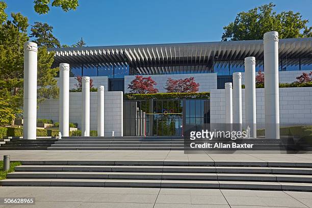 facade of lausanne's olympic museum - olympic museum lausanne stock pictures, royalty-free photos & images