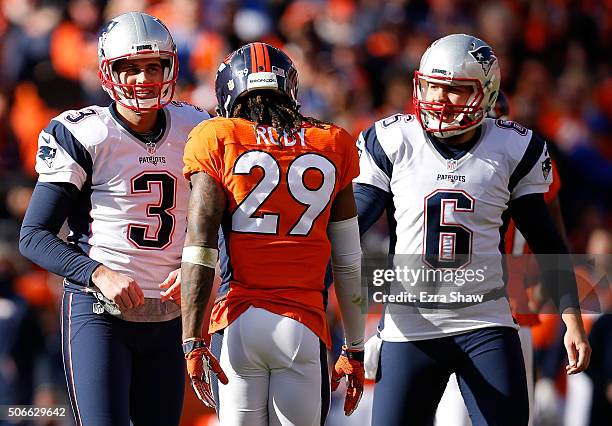 Stephen Gostkowski and Ryan Allen of the New England Patriots look on after a missed extra point in the first quarter against the Denver Broncos in...