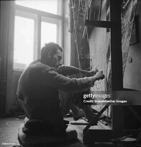 The Austrian artist Friedensreich Hundertwasser in his studio. Vienna. About 1952. .