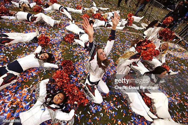 The Denver Broncos cheerleaders celebrate after defeating the New England Patriots in the AFC Championship game at Sports Authority Field at Mile...