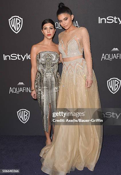 Personalities Kourtney Kardashian and Kylie Jenner arrive at the 2016 InStyle And Warner Bros. 73rd Annual Golden Globe Awards Post-Party at The...