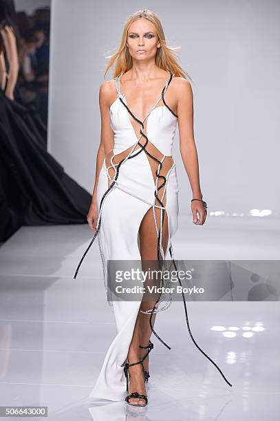 Model Natasha Poly walks the runway during the Versace Haute Couture Spring Summer 2016 show as part of Paris Fashion Week on January 24, 2016 in...