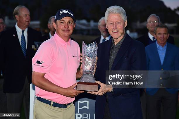 Jason Dufner poses with former President Bill Clinton after winning the CareerBuilder Challenge In Partnership With The Clinton Foundation at the TPC...