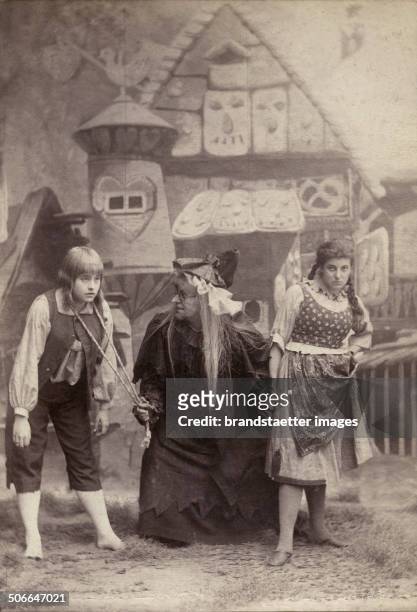 Paula Mark as Gretel, Marie Ranard as Hansel and Marie Lehmann as the Gingerbread Witch in the opera >Hansel and Gretel< by Engelbert Humperdinck....