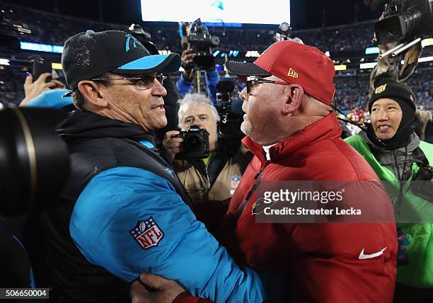 Head coach Ron Rivera of the Carolina Panthers shakes hands with head coach Bruce Arians of the Arizona Cardinals after the Carolina Panthers defeat...