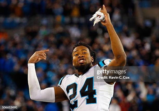 Josh Norman of the Carolina Panthers celebrates in the fourth quarter against the Arizona Cardinals during the NFC Championship Game at Bank of...