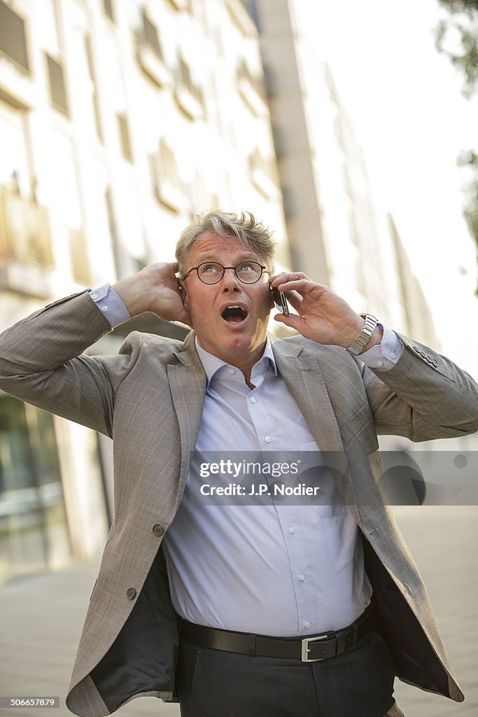 Businessman shouting on the phone